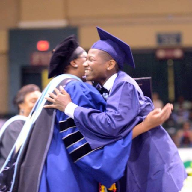 Graduates hugging